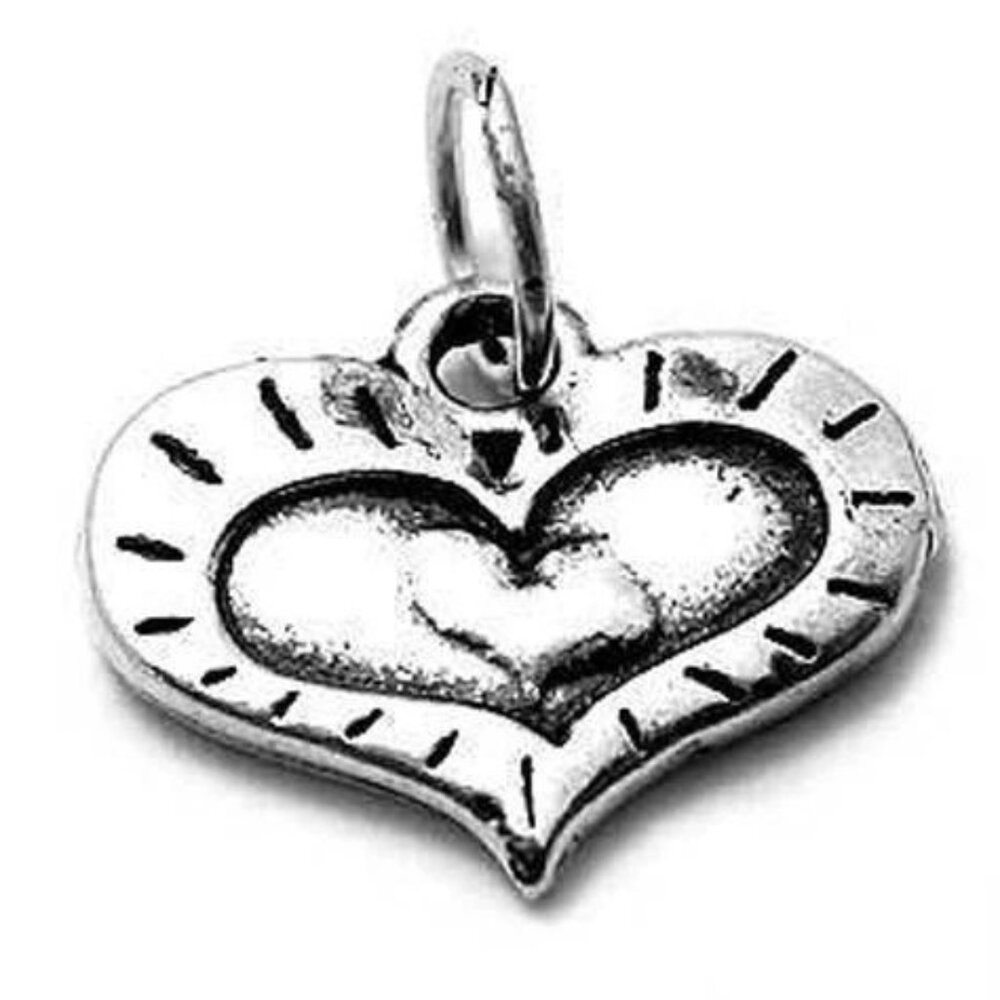 Lovely Radiant Heart Charm In Sterling Silver